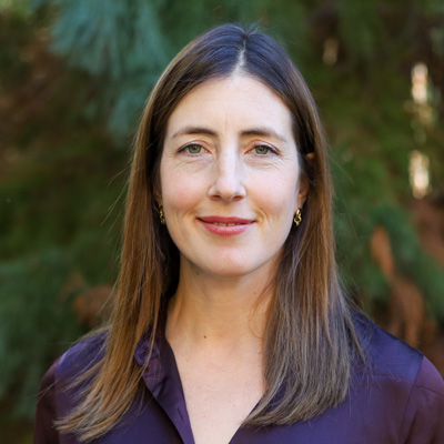Woman with brown hair smiling