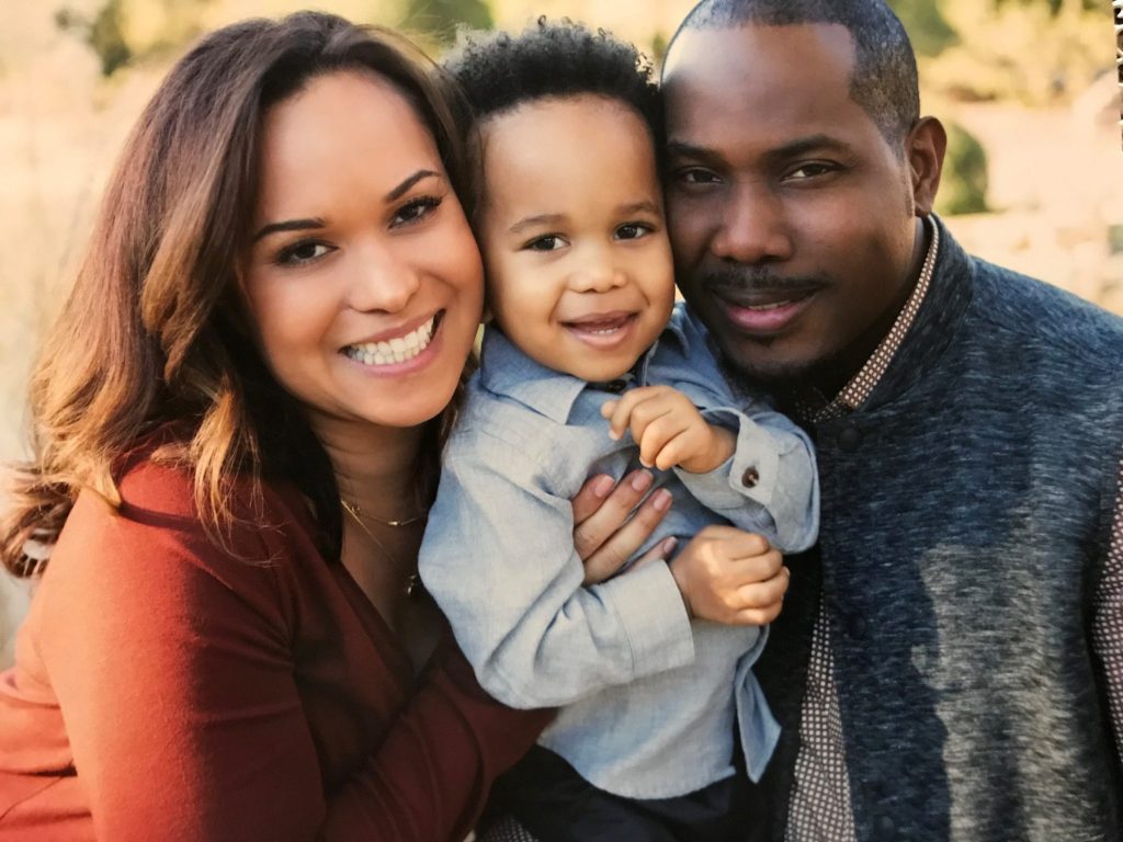 New board member Anthony Ewell with his partner Denise and their son Anden