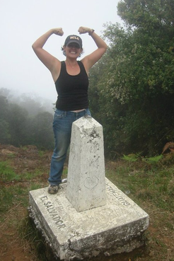Bri poses at the the border of El Salvador and Guatemala.