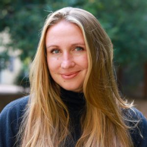 Chloe Hall 400p Woman in black shirt smiling