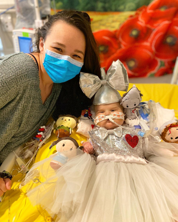 Baby dressed up for halloween with Mom