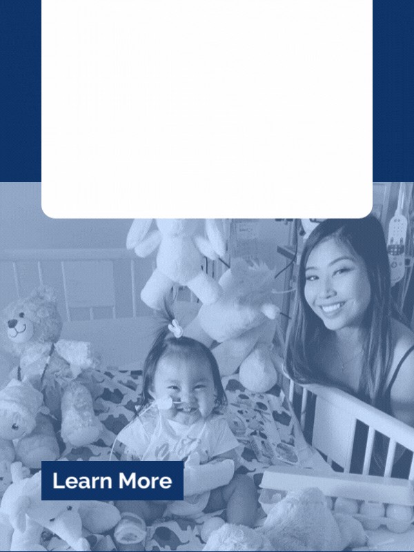 23,832 overnight stays for families nearby and inside the hospital. Smiling child in a hospital bed surrounded by stuffed animals with a woman beside her and red hearts on the image.