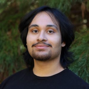 Hector Peccorini 400p Man in black shirt smiling