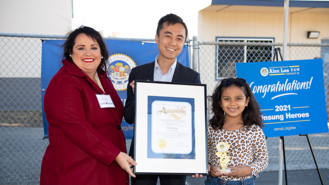 Chief Mission Officer, Bri Seoane with daughter, Izzy and Assembly Member Alex Lee