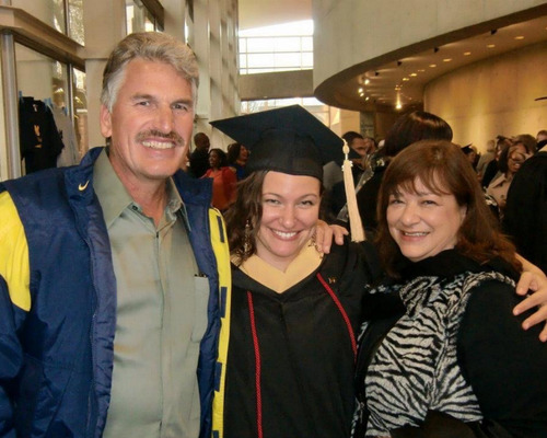 Nicole with her parents at jer graduation from University of Michigan School of Social Work