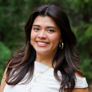 Xiadani Juarez 400p Woman in white shirt smiling at camera