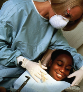 A child visits the Ronald McDonald Care Mobile for a dental check up